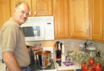 Trent Rasmussen stirs his homemade salsa.