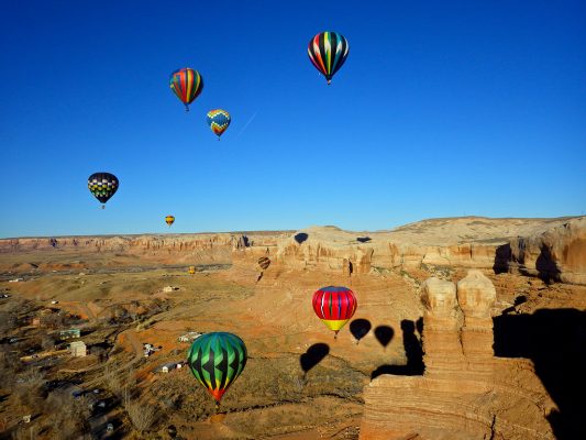 Hot air balloons flying over southern Utah