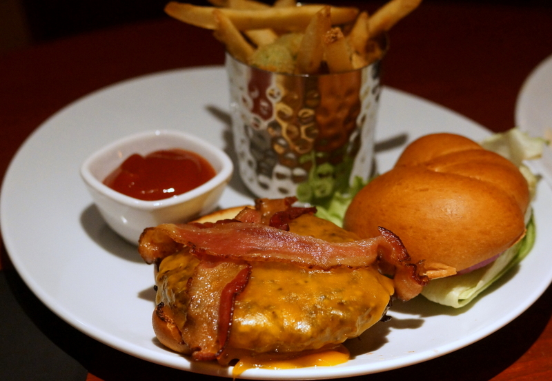 Fleming’s Prime Steakhouse & Wine Bar Prime beef burger with bacon and cheese