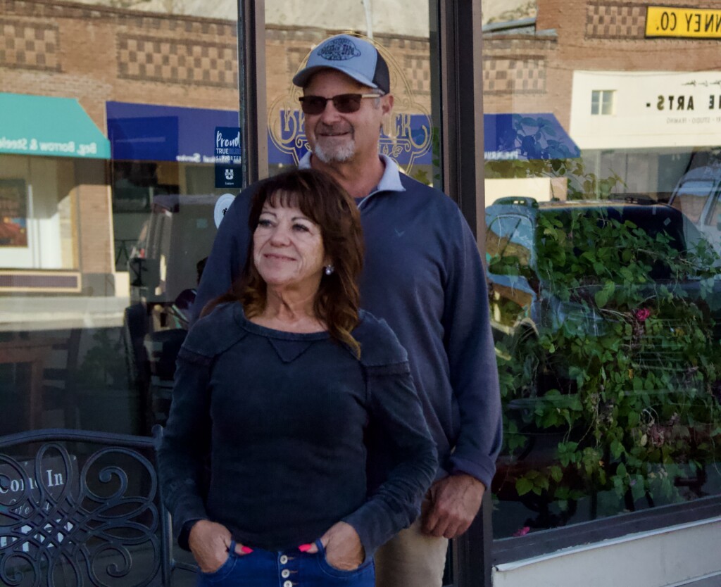 Cindi Edwards - Curry with her husband Clay in front of their restaurant Balance Rock in Helper, Utah.
