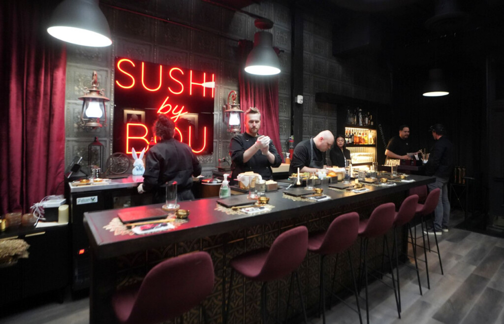 Sushi chefs preparing omakase at the bar inside Sushi by Boū in Salt Lake City